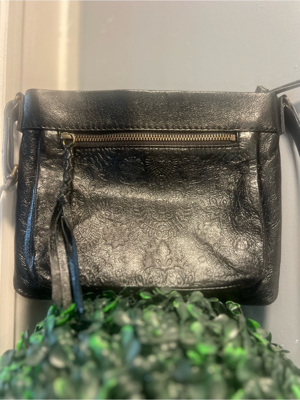 The Sak Black Embossed Leather Crossbody with Tassel Zip